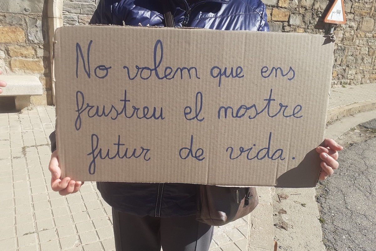 Pancarta de protesta d’una treballadora de la residència