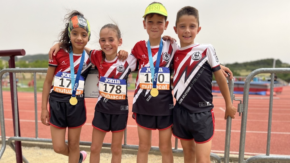Els quatre atletes del club poblatà després de la competició
