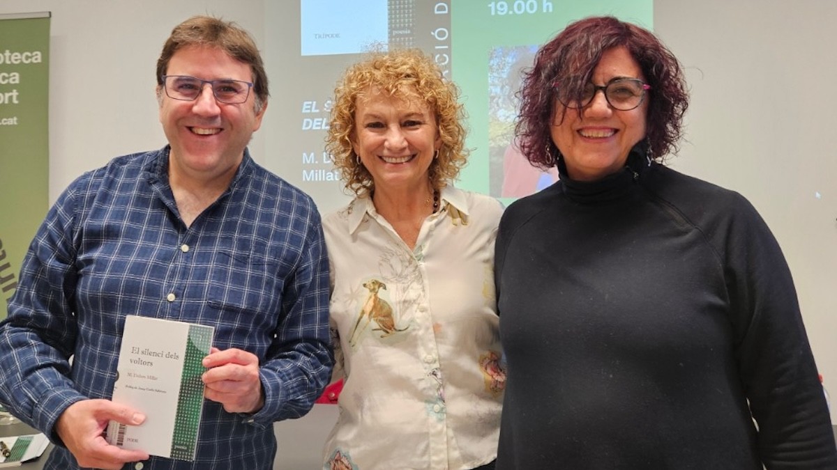 Millat amb el director de la Biblioteca de Sort, Rosendo Manrique, i l'escriptora Raquel Picolo