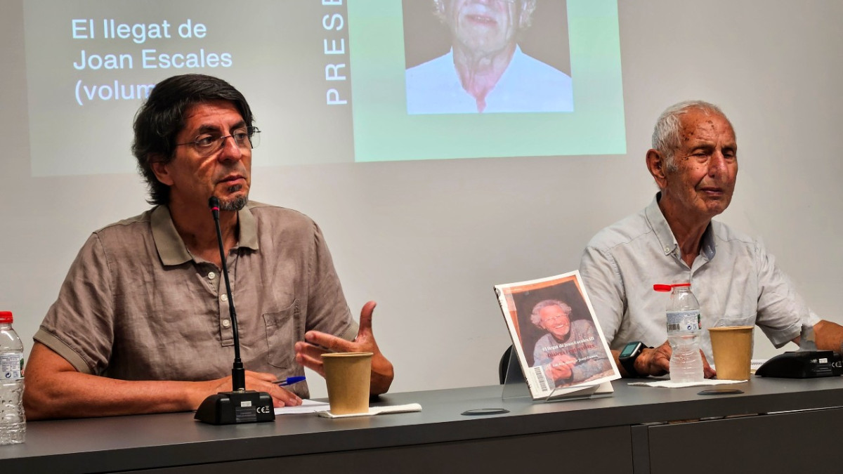 Xavier Perarnau i Josep Escales durant la presentació del llibre a Sort